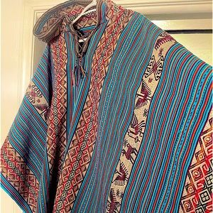 Original Peruvian wool poncho one size 26in L x 60in W multi colored new no tag